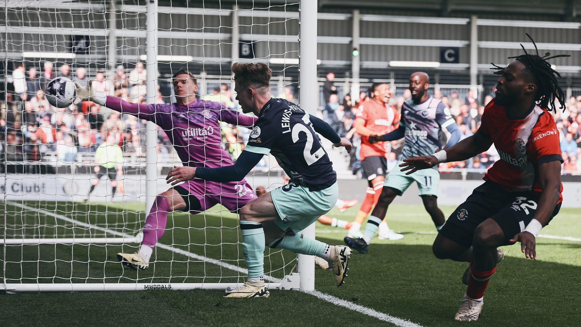 Running riot: Keane Lewis-Potter adds a fourth moments after the restart